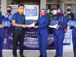 Inez Cosmetic Serahkan Bantuan Hand Sanitizer di Payakumbuh